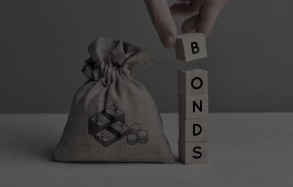 Kenyan SME owner preparing tender documents with bid bond